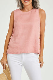 Model Luisa wearing size 10 of the Side Button Cami in colour Mango (Pink), from the front, cropped image