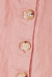 Product shot of the Side Button Cami in colour Mango (Pink), detail