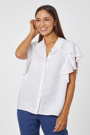 Model Cara wearing size 10 of the Ruffle Sleeve Shirt in colour White (White), from the front, cropped image