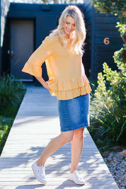 Model Kelly wearing size 10 of the Miracle Denim Skirt in colour Washdenim (Blue), from the front, showing the whole outfit