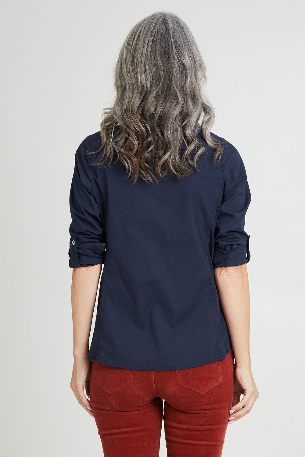 Model Luisa wearing size 10 of the Emma Rib Detail Shirt in colour Navy (Blue), from the back