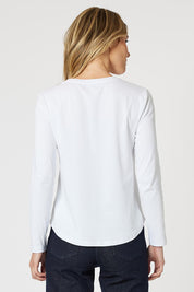 A model wearing the Crew Neck Long Sleeve Cotton Top in colour White (White), from the back