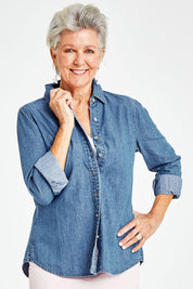 Model Elise wearing size 10 of the Denim Shirt in colour Denim (Blue), from the front, cropped image