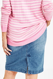 Model Elise wearing size 10 of the Miracle Denim Straight Skirt in colour Denim (Blue), from the back