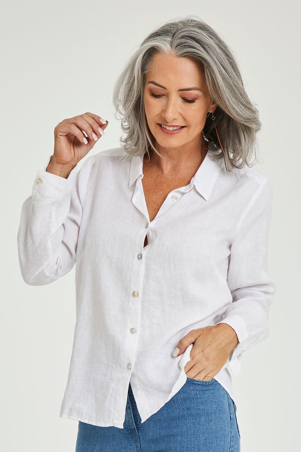 Model Luisa wearing size 10 of the Classic Linen Shirt in colour White (White), from the front, cropped image