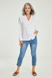 Model Luisa wearing size 10 of the Classic Linen Shirt in colour White (White), from the front, showing the whole outfit