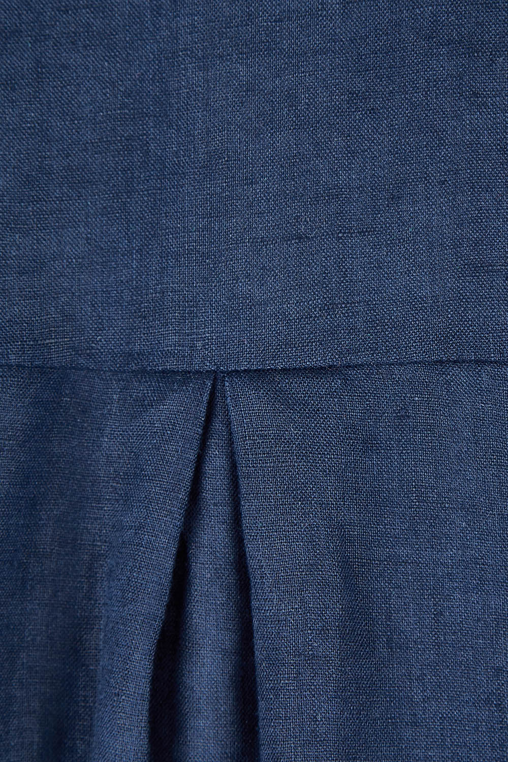 Product shot of the Ruffle Hem Linen Shirt in colour Navy (Blue), detail