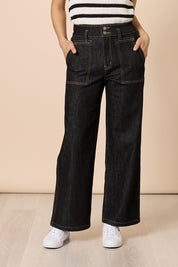 Model Genericm wearing size sample of the Hudson Wide Leg Jean - Black in colour Black, from the front