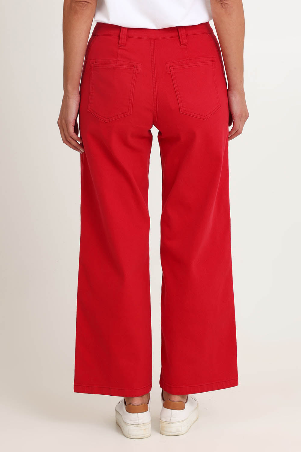 Model Riina wearing size 10 of the Hudson Wide Leg Jean in colour Red (Red), from the back