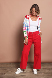 Model Riina wearing size 10 of the Hudson Wide Leg Jean in colour Red (Red), from the front, showing the whole outfit