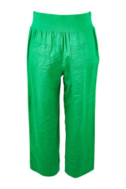 Product shot of the Classic Wide Leg Linen Pant in colour Emerald (Green), from the back