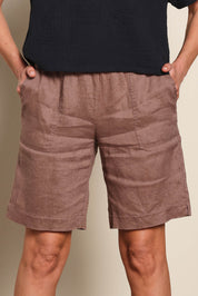 Model Riinar wearing size 10 of the Jersey Waist Linen Short - Mocha in colour Mocha, in a cropped view