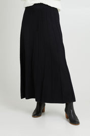 Model Luisa wearing size S of the Kate Knit Long Skirt in colour Black (Black), from the front, cropped image