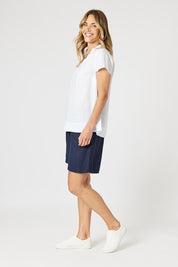 A model wearing the Lino Linen Blend Shorts in colour Navy (Blue), from the front, showing the whole outfit
