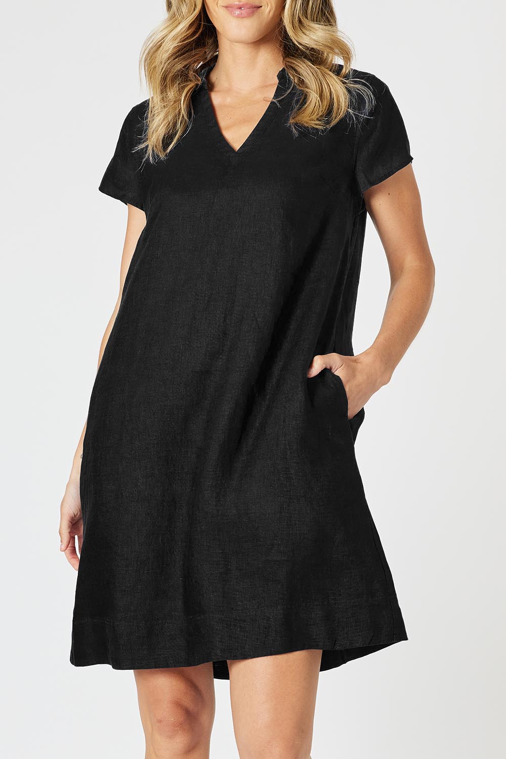 A model wearing the Delta Lino Linen Blend Dress in colour Black (Black), from the front, cropped image