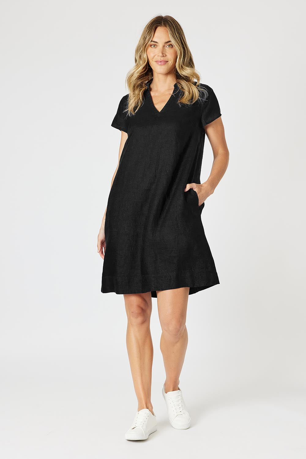 A model wearing the Delta Lino Linen Blend Dress in colour Black (Black), from the front, showing the whole outfit