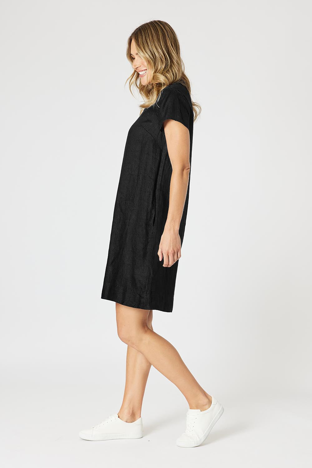 A model wearing the Delta Lino Linen Blend Dress in colour Black (Black), from the front, showing the whole outfit