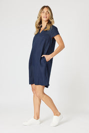 A model wearing the Delta Lino Linen Blend Dress in colour Navy (Blue), from the front, showing the whole outfit