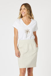 A model wearing the Lino Linen Blend Skirt in colour Natural, from the front, cropped image