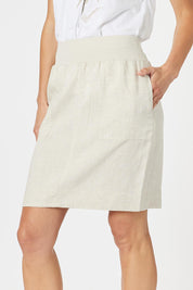 A model wearing the Lino Linen Blend Skirt in colour Natural, from the front, cropped image