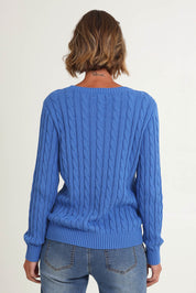 Model Riina wearing size S of the Hampton Cable Knit Jumper in colour Cobalt (Blue), from the back
