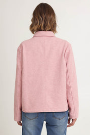 Model Riina wearing size 10 of the Montana Car Coat in colour Blush (Pink), from the back