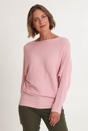 Model Riina wearing size S of the Billie Ribbed Knit in colour Blush (Pink), from the front, cropped image