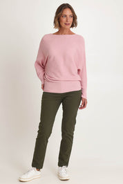 Model Riina wearing size S of the Billie Ribbed Knit in colour Blush (Pink), from the front, showing the whole outfit