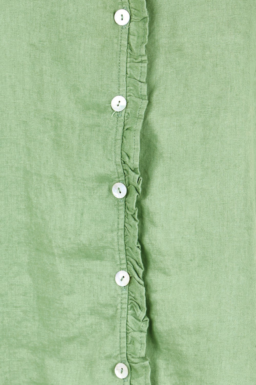 Product shot of the Audrey Ruffle Linen Top - Fern in colour Fern, showing detail