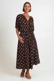Model Riinar wearing size 10 of the Riviera Spot Top – Coffee in colour Coffee, from the front