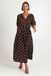 Model Riinar wearing size 10 of the Riviera Spot Skirt – Coffee in colour Coffee, from the front