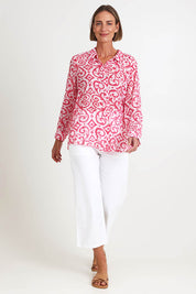 Model Riinar wearing size 10 of the Provence Print Shirt – Raspberry in colour Raspberry, from the front