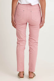Model Riina wearing size 10 of the Slim Miracle Denim Jeans in colour Blush (Pink), from the back