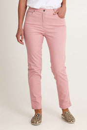 Model Riina wearing size 10 of the Slim Miracle Denim Jeans in colour Blush (Pink), from the front, cropped image
