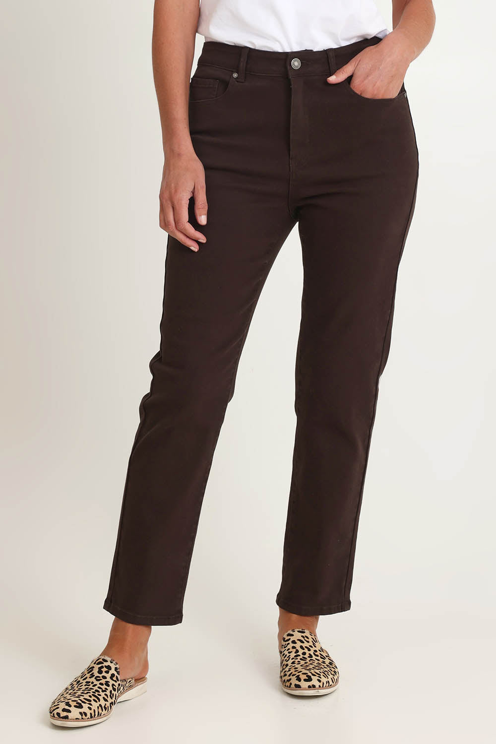 Model Riina wearing size 10 of the Slim Miracle Denim Jeans in colour Coffee, from the front, cropped image