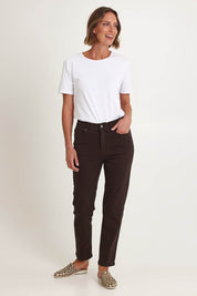 Model Riina wearing size 10 of the Slim Miracle Denim Jeans in colour Coffee, from the front, showing the whole outfit