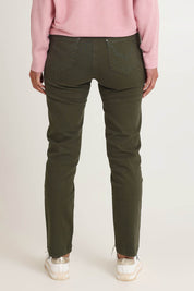 Model Riina wearing size 10 of the Slim Miracle Denim Jeans in colour Khaki (Green), from the back