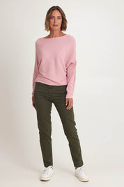 Model Riina wearing size 10 of the Slim Miracle Denim Jeans in colour Khaki (Green), from the front, showing the whole outfit