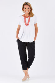 Model Louise wearing size 10 of the Pull On Linen Pant in colour Black (Black), from the front, showing the whole outfit