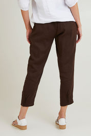 Model Grace wearing size 10 of the Pull On Linen Pant in colour Koko, from the back