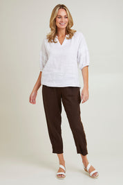 Model Grace wearing size 10 of the Pull On Linen Pant in colour Koko, from the front, showing the whole outfit