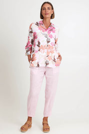 Model Riinar wearing size 10 of the Pull On Linen Pant - Palepink in colour Palepink, from the front