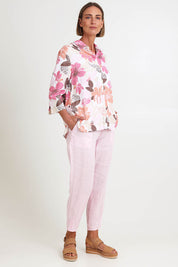Model Riinar wearing size 10 of the Pull On Linen Pant - Palepink in colour Palepink, from the front