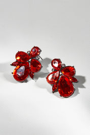 A model wearing size OneSize of the Small Bling Earrings in colour Red (Red), from the front, showing the whole outfit