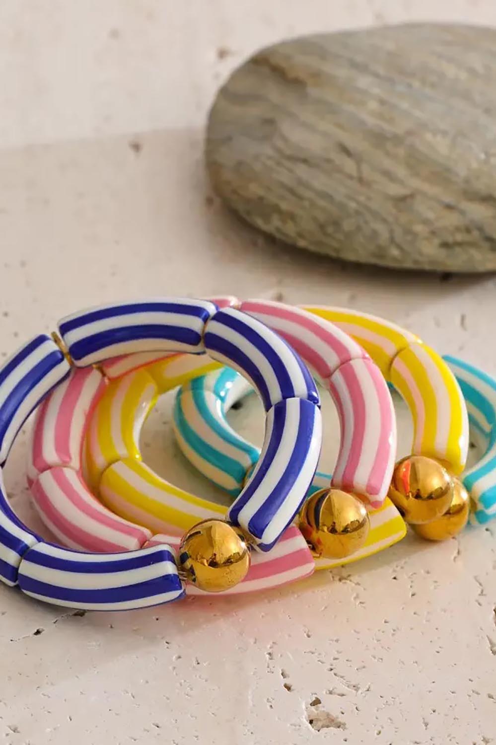 Product shot of the Candy Stripe Stretch Bracelet - Aqua in colour Aqua, from the back