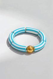Product shot of the Candy Stripe Stretch Bracelet - Aqua in colour Aqua, from the front