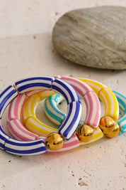 Product shot of the Candy Stripe Stretch Bracelet - Pink in colour Pink, showing detail