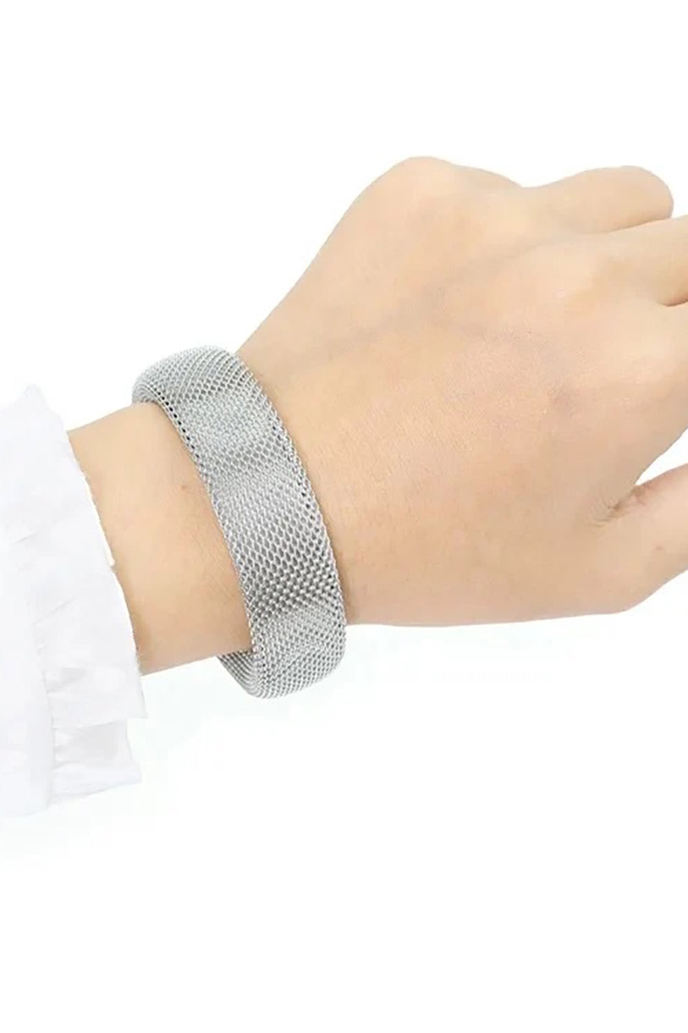 A model wearing the Elegance Mesh Cuff in colour Silver (Metallics), from the front, showing the whole outfit