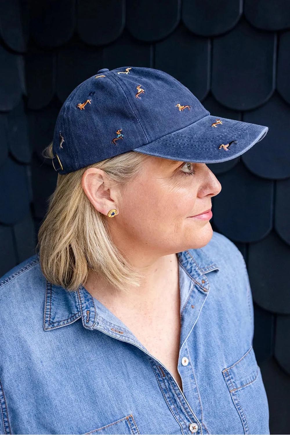 Model Genericm wearing size sample of the Embroidered Cap - Dacshundnavy in colour Dacshundnavy, from an angle