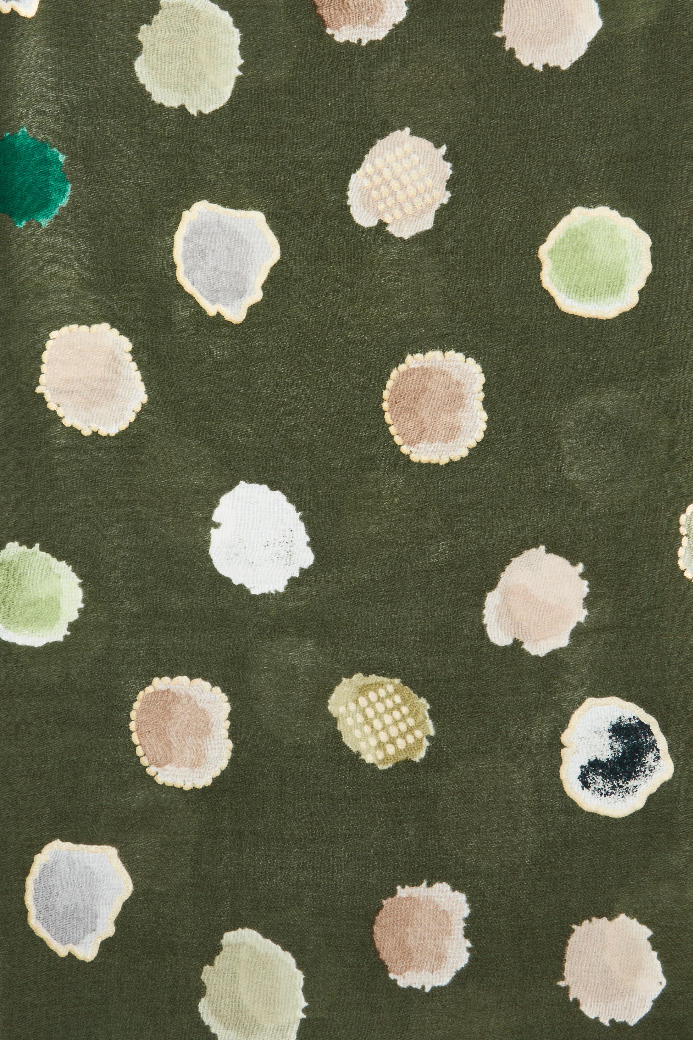 Product shot of the Jamie Scarf in colour Greenspot (Green), detail